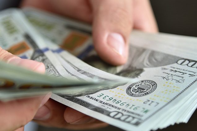 a person counting money