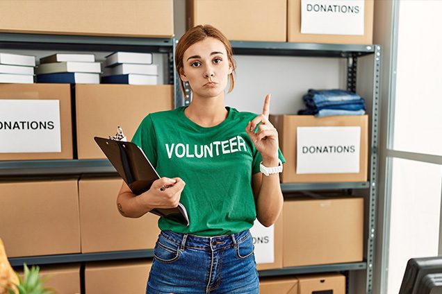a woman looking for more volunteers
